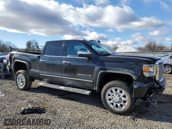 2017 GMC Sierra 2500HD Denali z VIN 1GT12UEG1HF104744, wystawiony jako Copart lot #43969425 z przebiegiem 129 674 mil mil oraz Szkoda całkowita • Salvage title. Historia ofert i sprzedaży dostępna na DreamBid. Obrazek 4.