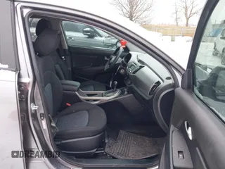 2016 Kia Sportage LX with VIN KNDPB3AC2G7847526, listed as a IAAI auction lot 41326209 with 202,657 mi miles. Bid and sale history available at carsss.com. Image 5.