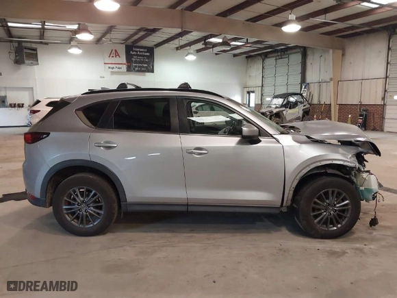 2019 Mazda CX-5 Touring with VIN JM3KFACM7K1551252, listed as a IAAI auction lot 41580918 with NaN miles. Bid and sale history available at carsss.com. Image 13.