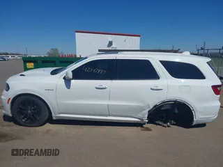 2021 Dodge Durango R/T with VIN 1C4SDJCT5MC520580, listed as a IAAI auction lot 42147987 with 104,430 mi miles and . Bid and sale history available at DreamBid. Image 14.