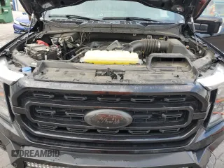 2023 Ford F-150 XL with VIN 1FTFW1E5XPKD88243, listed as a Copart auction lot 62351105 with 29,046 mi miles and Salvage title. Bid and sale history available at DreamBid. Image 11.