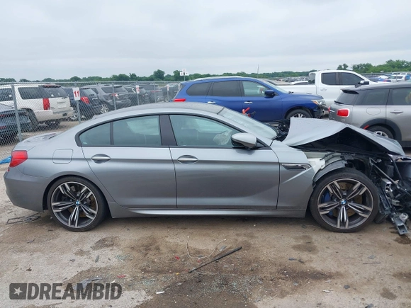 2014 BMW M6 with VIN WBS6C9C54EDV73926, listed as a IAAI auction lot 42421586 with 82,216 mi miles and . Bid and sale history available at DreamBid. Image 14.