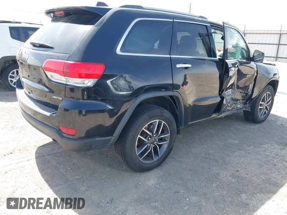 2019 Jeep Grand Cherokee Limited with VIN 1C4RJFBG0KC842131, listed as a IAAI auction lot 41813345 with 59,164 mi miles. Bid and sale history available at carsss.com. Image 4.
