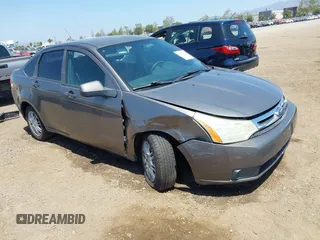 2009 Ford Focus SE with VIN 1FAHP35N69W244451, listed as a IAAI auction lot 42104982 with 199,524 mi miles. Bid and sale history available at carsss.com. Image 1.
