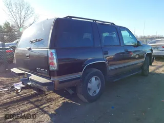 1996 Chevrolet Tahoe with VIN 1GNEK13R9TJ336722, listed as a IAAI auction lot 41576273 with 163,609 mi miles. Bid and sale history available at carsss.com. Image 4.