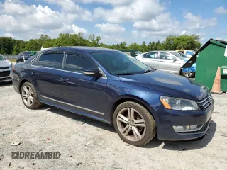 2014 Volkswagen Passat SEL Premium with VIN 1VWCN7A32EC018096, listed as a Copart auction lot 56972805 with 118,515 mi miles and Non repairable. Bid and sale history available at DreamBid. Image 4.