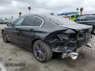 2023 BMW 5 Series 530e with VIN WBA13AG01PCM24624, listed as a Copart auction lot 55149855 with 26,022 mi miles and Salvage title. Bid and sale history available at DreamBid. Image 2.