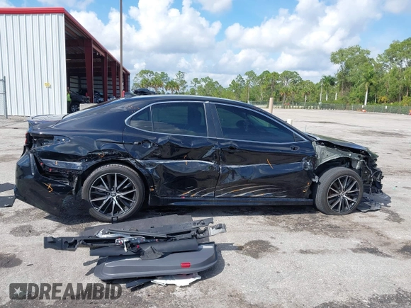 2023 Toyota Camry SE with VIN 4T1G11AK6PU741172, listed as a IAAI auction lot 41599909 with 56,668 mi miles and . Bid and sale history available at DreamBid. Image 19.