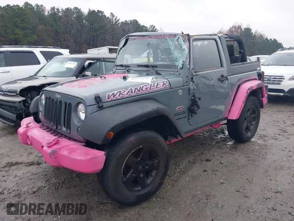 2015 Jeep Wrangler Sport with VIN 1C4AJWAG3FL589214, listed as a IAAI auction lot 41056259 with 101,758 mi miles and . Bid and sale history available at DreamBid. Image 2.