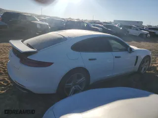 2017 Porsche Panamera with VIN WP0AA2A74HL102677, listed as a Copart auction lot 79771384 with 0 mi miles and Salvage Title. Bid and sale history available at carsss.com. Image 3.