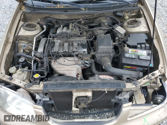 2001 Mazda 626 LX z VIN 1YVGF22C715202574, wystawiony jako Copart lot #54132915 z przebiegiem 237 041 mil mil oraz Szkoda całkowita • Salvage title. Historia ofert i sprzedaży dostępna na DreamBid. Obrazek 11.