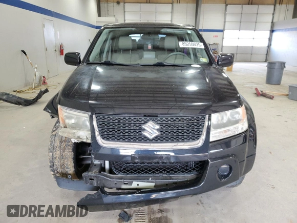 2012 Suzuki Grand Vitara Premium z VIN JS3TD0D66C4100814, wystawiony jako Copart lot #89250025 z przebiegiem 102 381 mil mil oraz Szkody całkowita. Historia ofert i sprzedaży dostępna na DreamBid. Obrazek 5.
