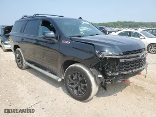 2022 Chevrolet Tahoe Z71 with VIN 1GNSKPKD8NR140433, listed as a Copart auction lot 64792034 with 51,675 mi miles and Salvage Title. Bid and sale history available at carsss.com. Image 4.