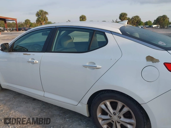 2013 Kia Optima LX with VIN 5XXGM4A77DG116306, listed as a IAAI auction lot 41872854 with 204,101 mi miles and . Bid and sale history available at carsss.com. Image 13.