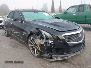 2016 Cadillac CTS-V z VIN 1G6A15S60G0104405, wystawiony jako IAAI lot #41616167 z przebiegiem 57 240 mil mil oraz . Historia ofert i sprzedaży dostępna na DreamBid. Obrazek 1.