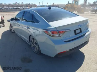 2016 Hyundai Sonata Hybrid Limited with VIN KMHE34L16GA009777, listed as a IAAI auction lot 41852137 with 79,589 mi miles. Bid and sale history available at carsss.com. Image 3.