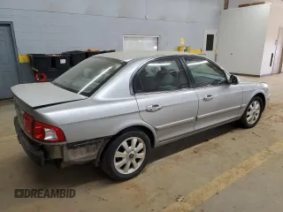 2005 Kia Optima LX z VIN KNAGD128155423463, wystawiony jako Copart lot #87441284 z przebiegiem 143 193 mil mil oraz Szkoda całkowita • Salvage title. Historia ofert i sprzedaży dostępna na DreamBid. Obrazek 3.