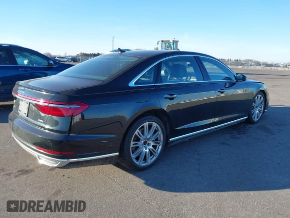 2019 Audi A8 L with VIN WAU8DAF8XKN018289, listed as a IAAI auction lot 41203292 with 28,758 mi miles. Bid and sale history available at carsss.com. Image 4.