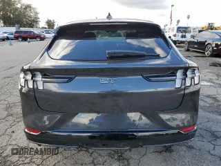 2022 Ford Mustang Mach-E GT z VIN 3FMTK4SX3NMA21062, wystawiony jako Copart lot #70915202 z przebiegiem Nie podano mil oraz . Historia ofert i sprzedaży dostępna na DreamBid. Obrazek 6.