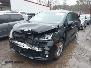 2019 Honda Odyssey EX-L with VIN 5FNRL6H75KB087076, listed as a IAAI auction lot 41542194 with 136,491 mi miles. Bid and sale history available at carsss.com. Image 2.