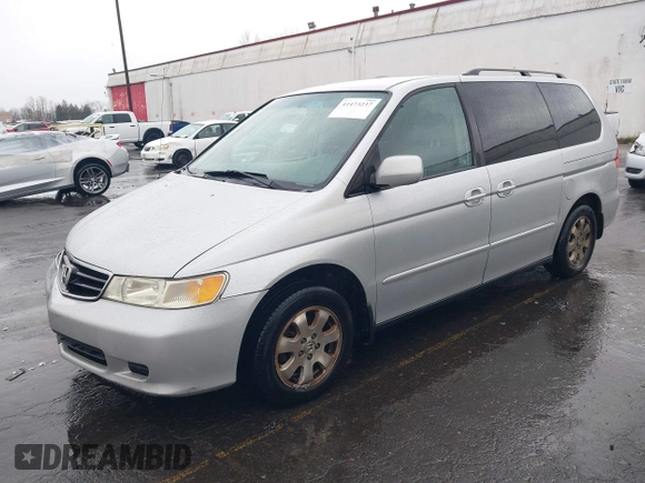 2004 Honda Odyssey EX-L with VIN 5FNRL18934B016420, listed as a IAAI auction lot 41473237 with 188,659 mi miles and . Bid and sale history available at DreamBid. Image 17.