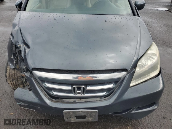 2005 Honda Odyssey EX-L with VIN 5FNRL38695B018174, listed as a Copart auction lot 45573885 with 207,393 mi miles and Salvage Title. Bid and sale history available at carsss.com. Image 12.