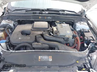2013 Ford Fusion SE Hybrid with VIN 3FA6P0LUXDR349019, listed as a IAAI auction lot 42800125 with 143,089 mi miles and . Bid and sale history available at DreamBid. Image 10.