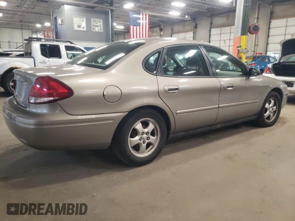 2005 Ford Taurus SE with VIN 1FAFP53U15A276082, listed as a Copart auction lot 52015285 with 103,479 mi miles and Salvage Title. Bid and sale history available at carsss.com. Image 3.