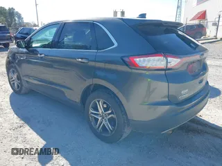 2015 Ford Edge Titanium z VIN 2FMTK3K90FBB13499, wystawiony jako IAAI lot #41492084 z przebiegiem 256 649 mil mil oraz . Historia ofert i sprzedaży dostępna na DreamBid. Obrazek 3.