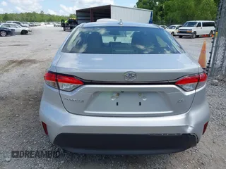 2023 Toyota Corolla LE with VIN JTDB4MEE7P3010297, listed as a IAAI auction lot 42119061 with 51,505 mi miles. Bid and sale history available at carsss.com. Image 16.