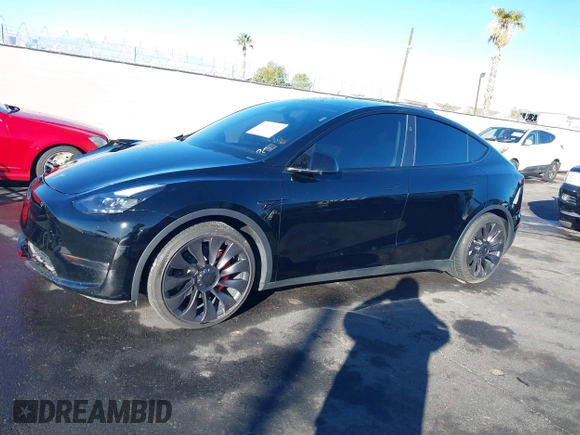 2023 Tesla Model Y Performance with VIN 7SAYGDEF6PF854797, listed as a IAAI auction lot 41319332 with 46,132 mi miles and . Bid and sale history available at DreamBid. Image 14.