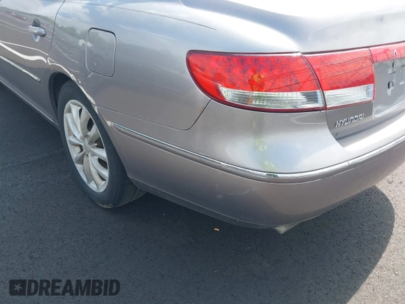 2007 Hyundai Azera SE with VIN KMHFC46F47A149693, listed as a IAAI auction lot 42060439 with 190,317 mi miles and . Bid and sale history available at DreamBid. Image 6.