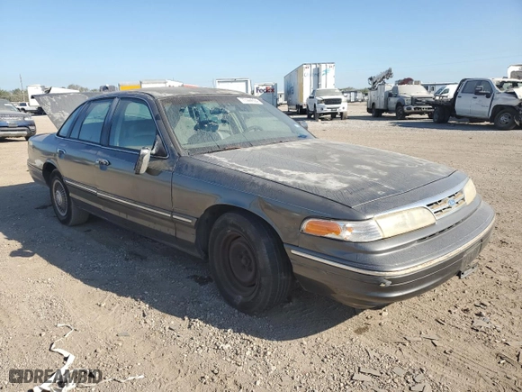1996 Ford Crown Victoria with VIN 2FALP73WXTX196123, listed as a Copart auction lot 77444094 with 173,540 mi miles and Salvage Title. Bid and sale history available at carsss.com. Image 4.