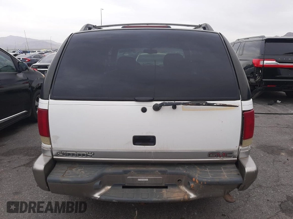 1999 GMC Jimmy SLE with VIN 1GKDT13W1X2551085, listed as a Copart auction lot 50553055 with 189,974 mi miles and Salvage Title. Bid and sale history available at carsss.com. Image 6.