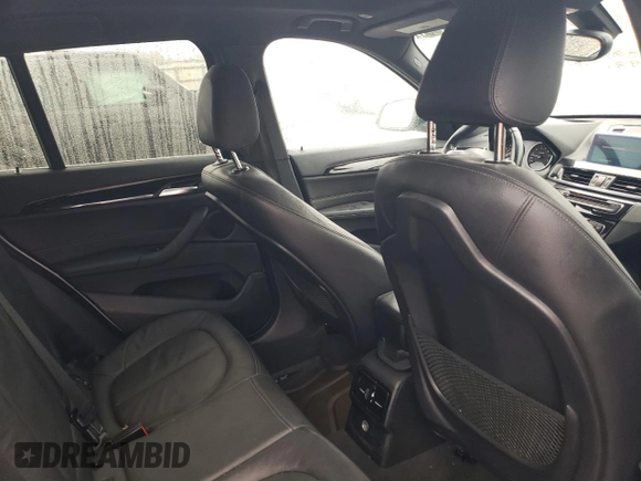 2018 BMW X1 xDrive28i with VIN WBXHT3C36J5F90135, listed as a Copart auction lot 43766955 with 76,530 mi miles and Salvage Title. Bid and sale history available at carsss.com. Image 10.