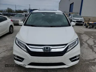 2020 Honda Odyssey Touring with VIN 5FNRL6H8XLB019365, listed as a Copart auction lot 52404335 with 59,486 mi miles and Salvage Title. Bid and sale history available at DreamBid. Image 5.