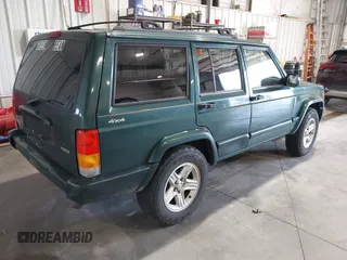 2001 Jeep Cherokee Sport with VIN 1J4FF58S51L579766, listed as a IAAI auction lot 42623211 with 257,681 mi miles and . Bid and sale history available at DreamBid. Image 4.