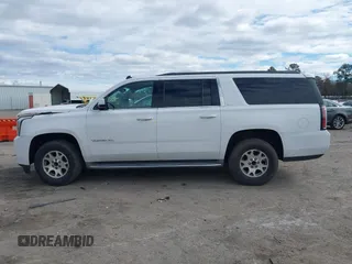 2015 GMC Yukon XL SLT with VIN 1GKS1HKC7FR126375, listed as a IAAI auction lot 41689017 with 218,622 mi miles. Bid and sale history available at carsss.com. Image 14.