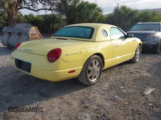 2002 Ford Thunderbird Hardtop Premium with VIN 1FAHP60A02Y104086, listed as a IAAI auction lot 41557195 with 44,882 mi miles and . Bid and sale history available at DreamBid. Image 4.