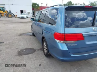 2010 Honda Odyssey EX-L with VIN 5FNRL3H69AB088994, listed as a IAAI auction lot 42007982 with 187,180 mi miles and . Bid and sale history available at DreamBid. Image 3.