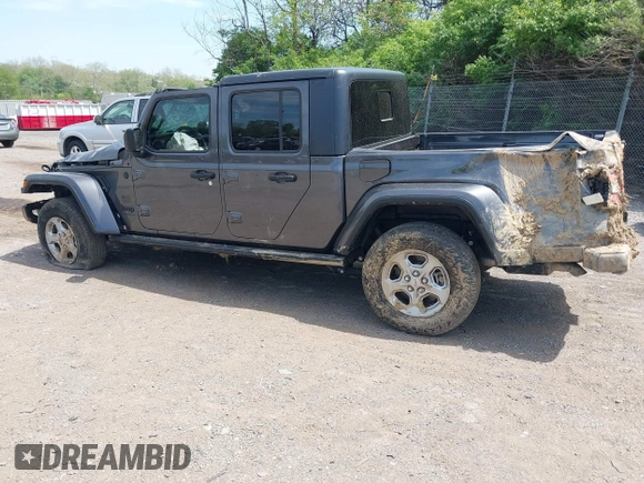 2021 Jeep Gladiator Freedom with VIN 1C6HJTAG3ML557932, listed as a IAAI auction lot 42150245 with 26,656 mi miles and . Bid and sale history available at DreamBid. Image 3.