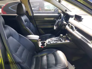2020 Mazda CX-5 Grand Touring with VIN JM3KFADM3L1812649, listed as a IAAI auction lot 42575393 with 102,118 mi miles and . Bid and sale history available at DreamBid. Image 5.