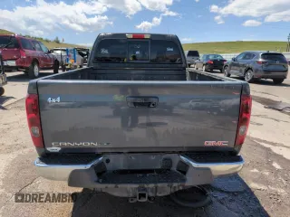 2008 GMC Canyon SLE1 z VIN 1GTDT19E088123694, wystawiony jako Copart lot #56679745 z przebiegiem 198 721 mil mil oraz Szkoda całkowita • Salvage title. Historia ofert i sprzedaży dostępna na DreamBid. Obrazek 6.