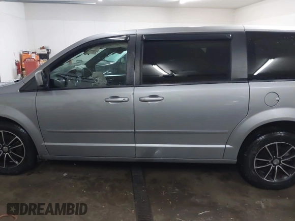 2015 Dodge Grand Caravan SE with VIN 2C4RDGBG9FR703691, listed as a IAAI auction lot 41395564 with 170,735 mi miles and . Bid and sale history available at DreamBid. Image 15.