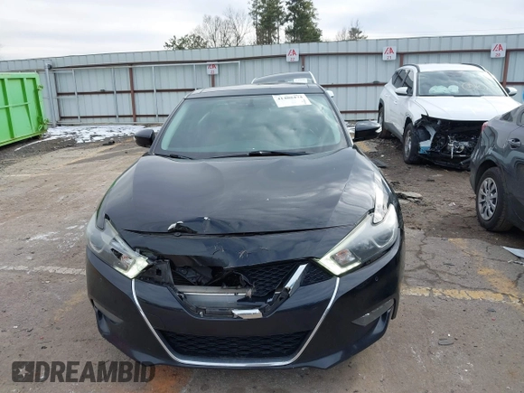 2018 Nissan Maxima SV with VIN 1N4AA6AP9JC383989, listed as a IAAI auction lot 41408474 with 195,135 mi miles and . Bid and sale history available at DreamBid. Image 12.