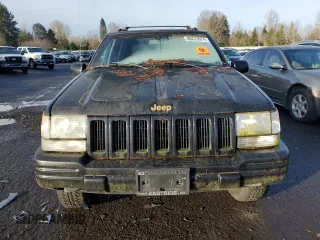 1998 Jeep Grand Cherokee Limited with VIN 1J4GZ78S0WC138917, listed as a Copart auction lot 86223974 with 152,482 mi miles and Clean Title. Bid and sale history available at carsss.com. Image 5.
