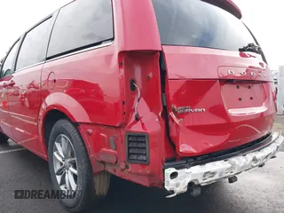 2014 Dodge Grand Caravan SXT with VIN 2C4RDGCG3ER257695, listed as a IAAI auction lot 41534568 with 116,896 mi miles and . Bid and sale history available at DreamBid. Image 6.