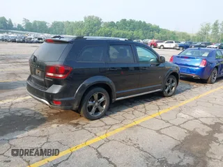 2015 Dodge Journey Crossroad with VIN 3C4PDDGG6FT740760, listed as a IAAI auction lot 42428742 with 215,219 mi miles and . Bid and sale history available at DreamBid. Image 4.