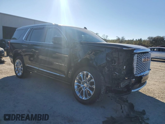 2024 GMC Yukon Denali with VIN 1GKS2DKL8RR173831, listed as a Copart auction lot 87831265 with 32,872 mi miles and Salvage Title. Bid and sale history available at carsss.com. Image 4.