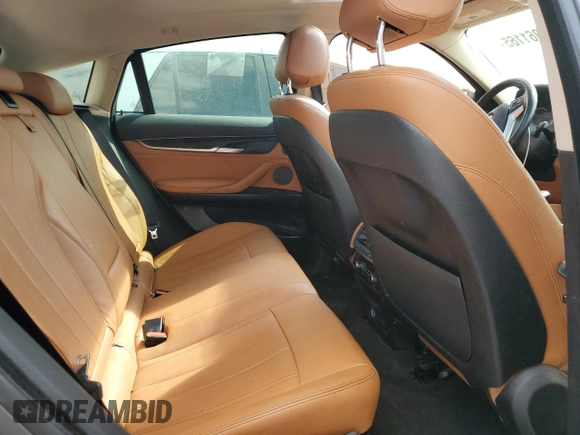 2015 BMW X6 xDrive35i z VIN 5UXKU2C57F0N76711, wystawiony jako Copart lot #53861165 z przebiegiem 133 429 mil mil oraz Czysty tytuł • Clean title. Historia ofert i sprzedaży dostępna na DreamBid. Obrazek 11.